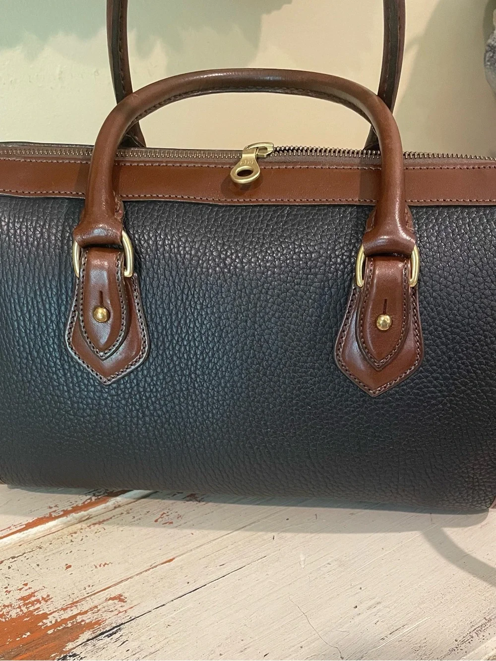 Dooney & Bourke vintage AWL Black and Brown Pebbled Leather Satchel / crossbody